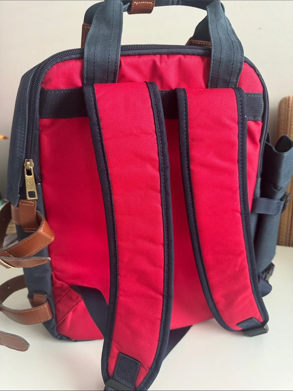 Navy and Red Canvas Backpack with Brown Trim